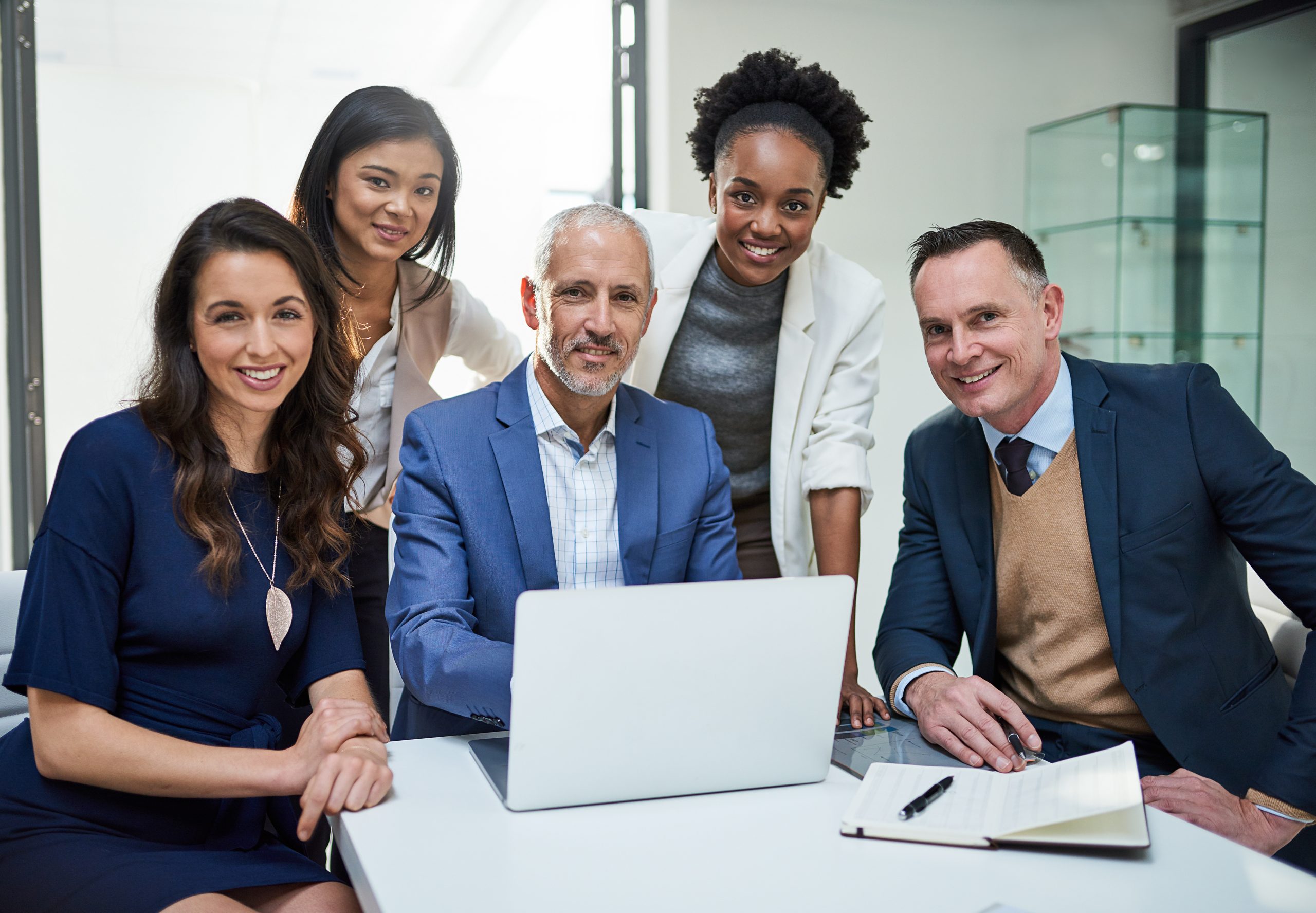 a group of businesspeople looking at us as they are part of utilization management in healthcare